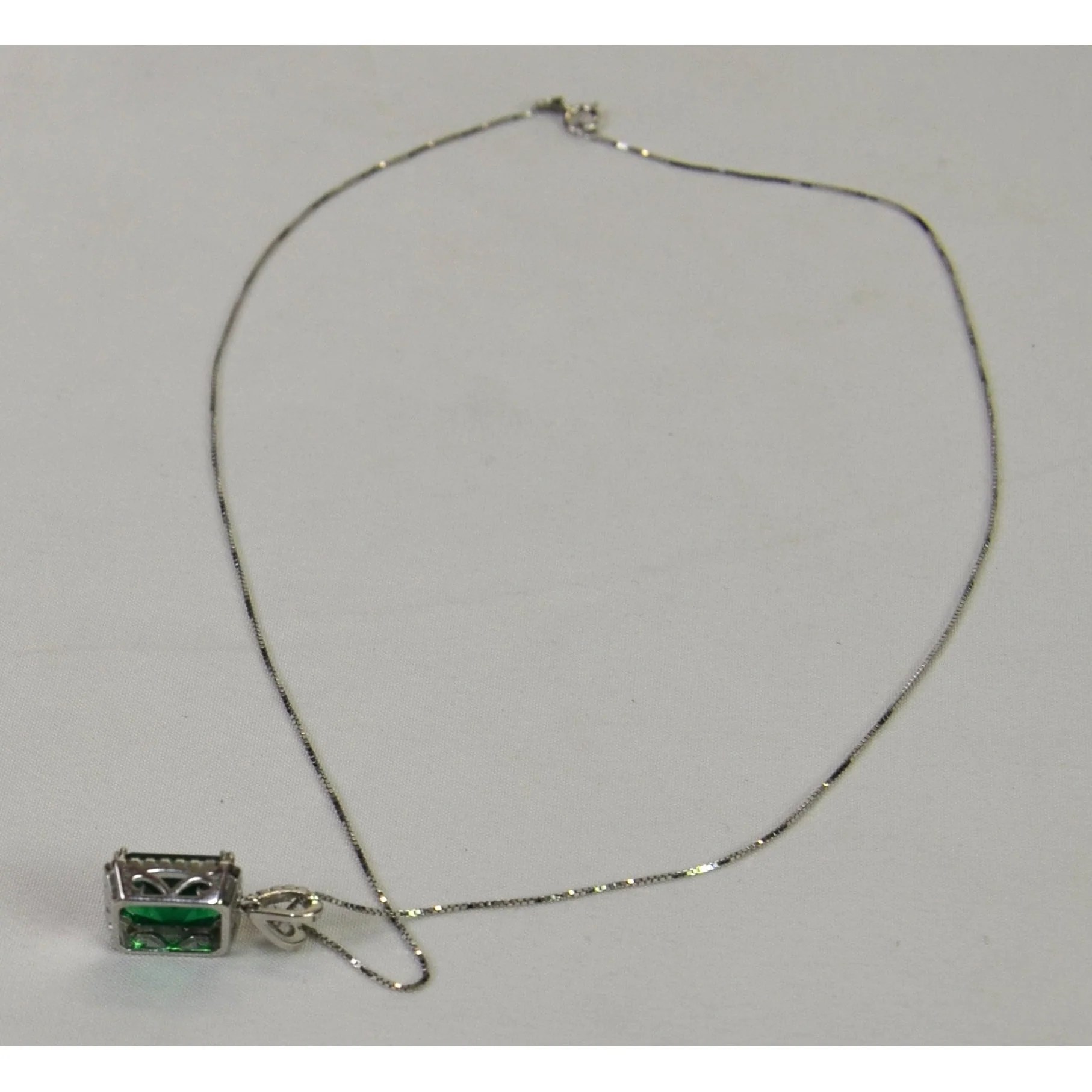 Sterling Silver 18" Necklace w/large green stone surrounded by clear stones - Image 2