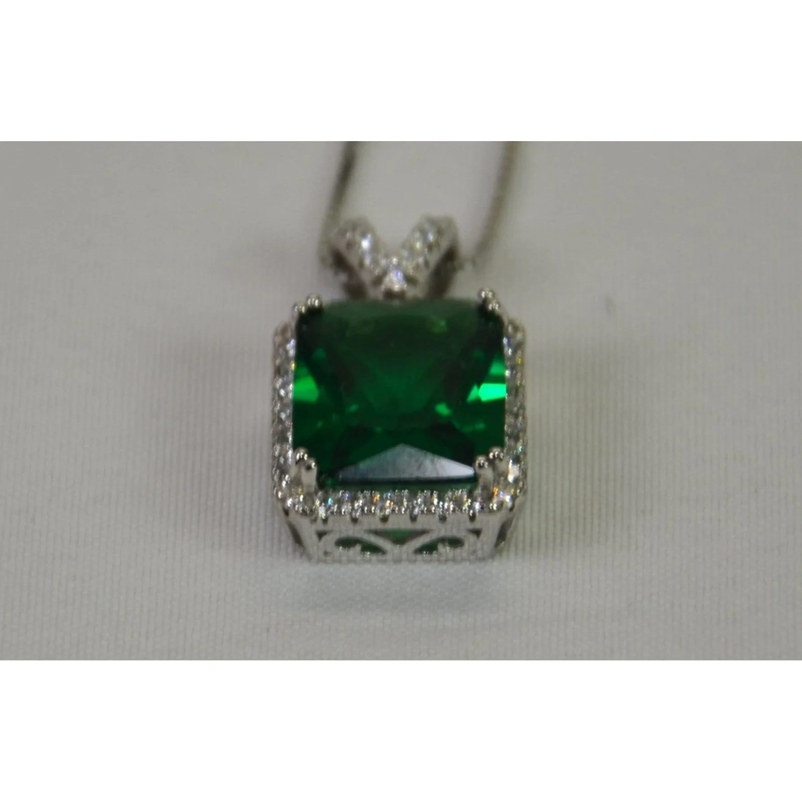 Sterling Silver 18" Necklace w/large green stone surrounded by clear stones - Image 3